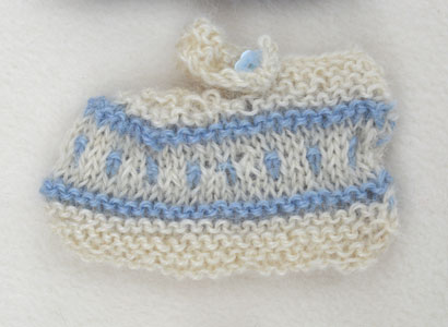 suzanne slipper cream with antique blue alpaca trim